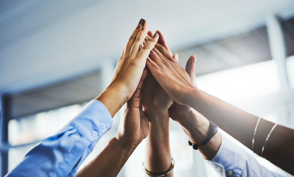 Meeting,,Group,And,Thumbs,Up,In,Negotiation,,Office,And,Agreement